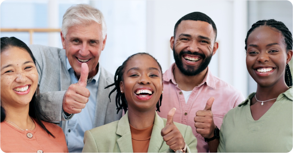 Happy employees smiling together